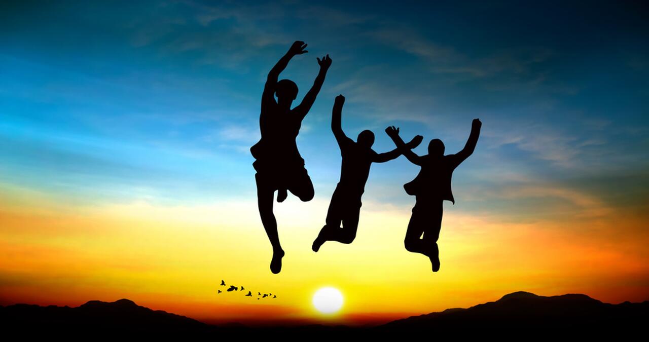 kids jumping in sunset picture